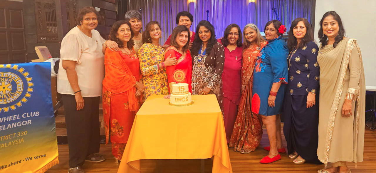 A group of women pose for a picture in front of a table with a cake on it.

AI generated content