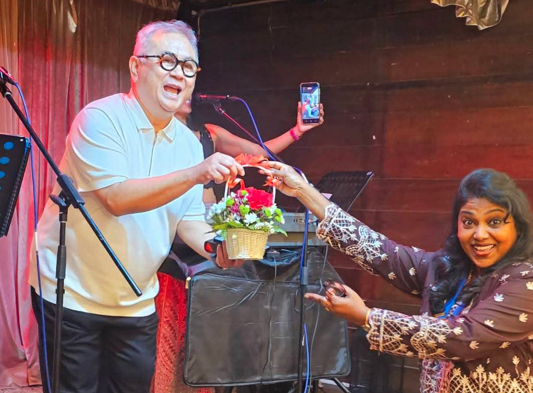 A man and woman are on stage, the woman holding a cell phone.

AI generated content
