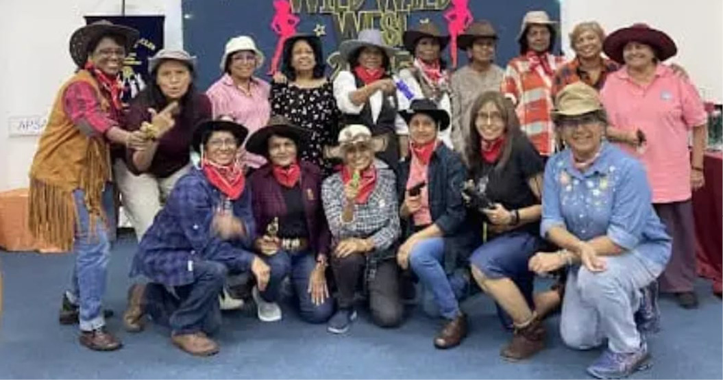 A group of people pose for a picture, some wearing cowboy hats.
AI generated content