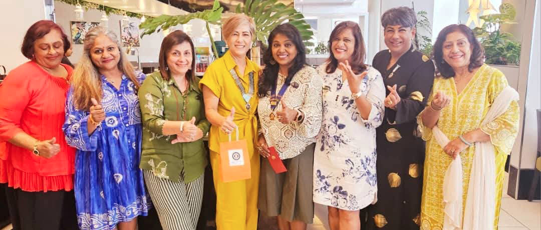 A group of women in a room, posing for a picture.
AI generated content