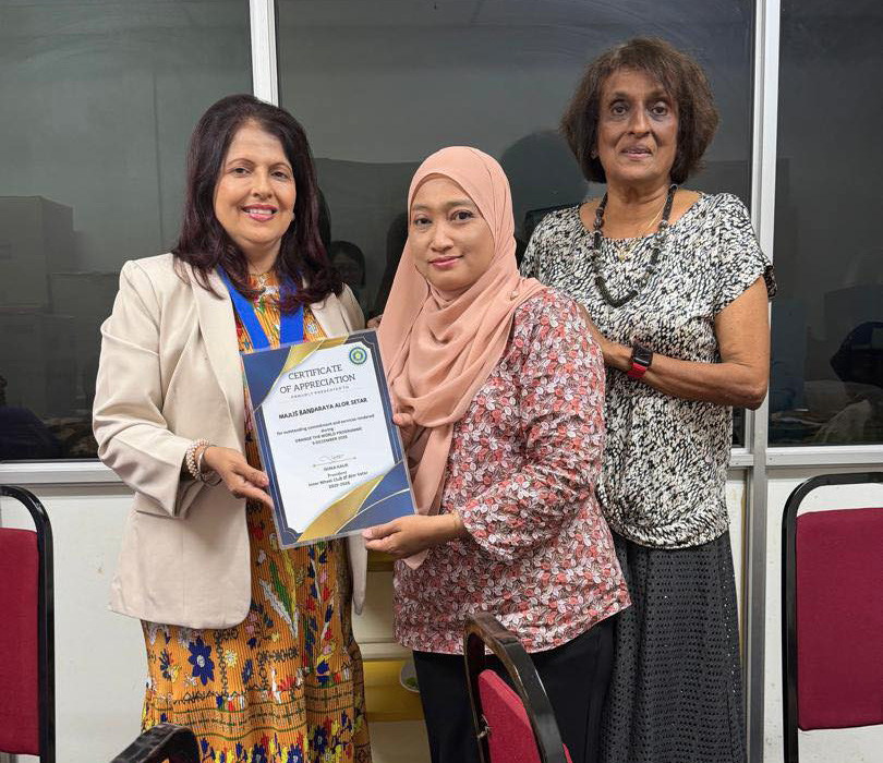 Three women are standing in front of a certificate. One of them is holding the certificate while the other two are posing for a picture.

AI generated content