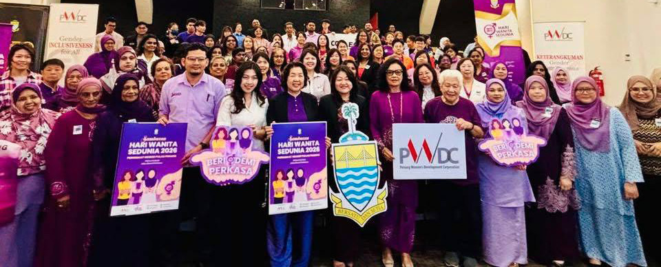 A large group of people are gathered in a room, holding up signs with a blue and yellow logo.
AI generated content