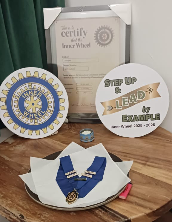 A wooden table with a plate holding a medal and a certificate.
AI generated content