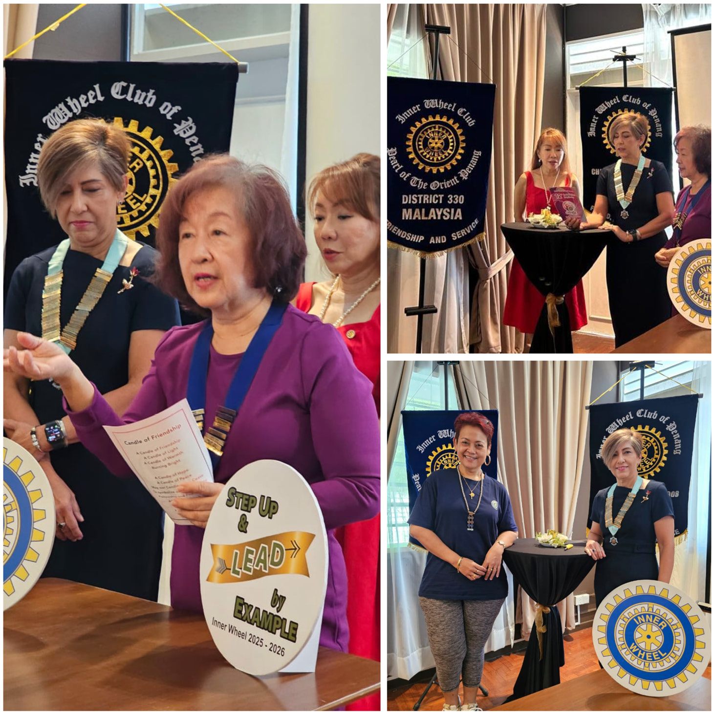 Three adults wearing ceremonial chains are speaking and standing near banners and a table with a sign that reads "Step Up & Lead by Example" in a formal indoor setting.
Description generated by AI