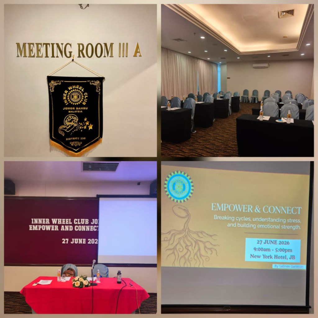 A conference room set up for a meeting with chairs and tables, a banner for Inner Wheel Club Johor Bahru, and a presentation slide titled Empower & Connect about breaking cycles and building emotional strength.
Description generated by AI