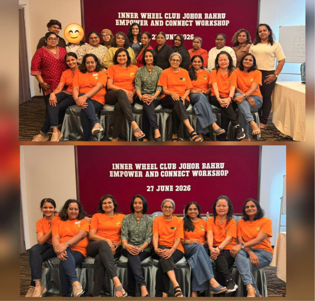 A group of people wearing orange shirts and casual clothing are seated and standing in front of a maroon backdrop with white text about an Inner Wheel Club Johor Bahru Empower and Connect Workshop dated June 27, 2026.
Description generated by AI